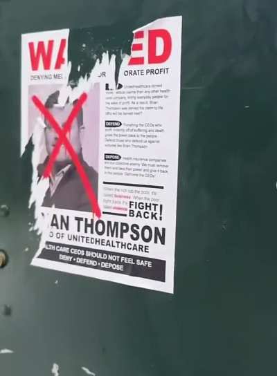 Wanted posters for healthcare CEOs in NYC