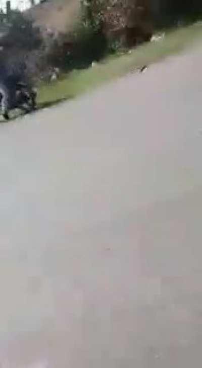 WCGW standing on a motorcycle