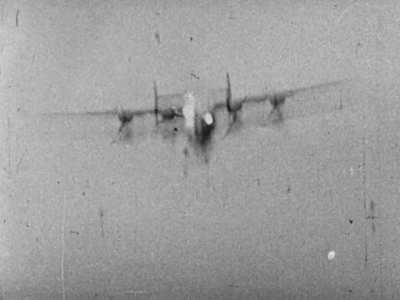 Cannon fire from a Focke Wulf Fw 190 shatters the flight deck of a B-24 Liberator in a head on pass in early 1944