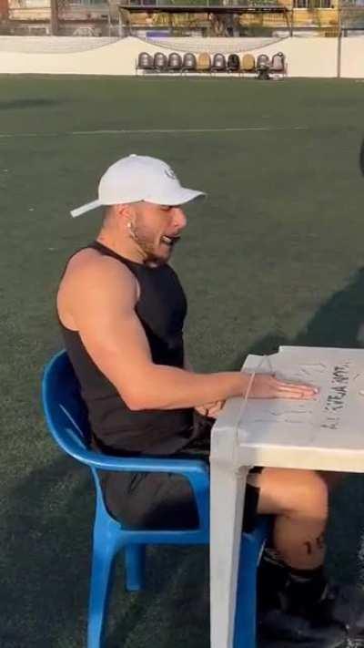 Blow the harmonica = another slap