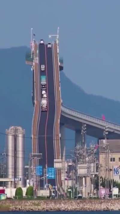 The Eshima Ohashi bridge in Japan is so steep it looks like a roller coaster.