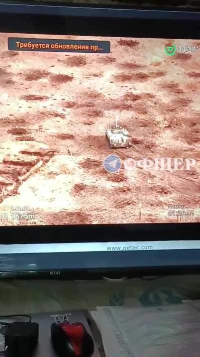 A Ukrainian soldier threw a grenade into the hatch of a Russian tank while approaching it closely