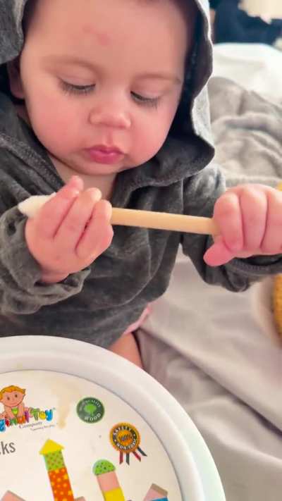 Teaching my daughter to play rhythm w/ a drum stick & this happened