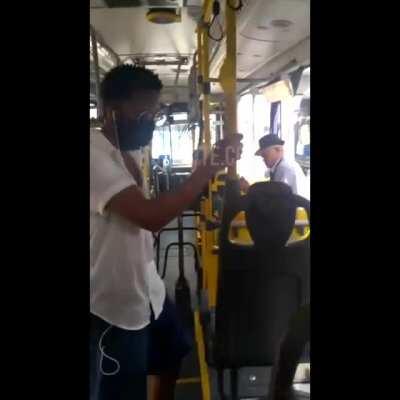 Old pervert flashes people on a bus in Brazil.