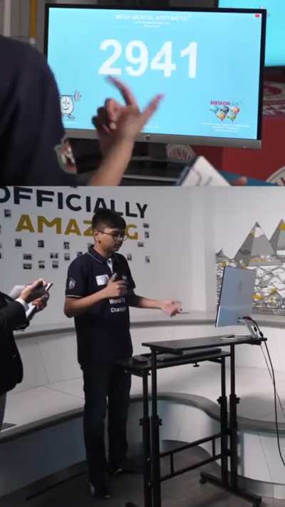 Fastest time to mentally add 100 four-digit numbers