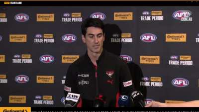 Matt Rosa addressing the media after not trading Zach Merrett