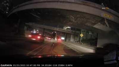 Car flies off a Freeway Bridge