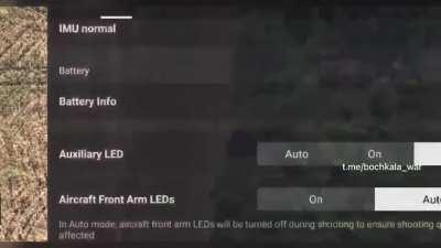 Ukrainian drone dropping a munition on a Russian soldier (music from source)