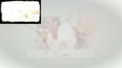 Smoking and trying to play a game, while hubby tries very hard to get noticed.