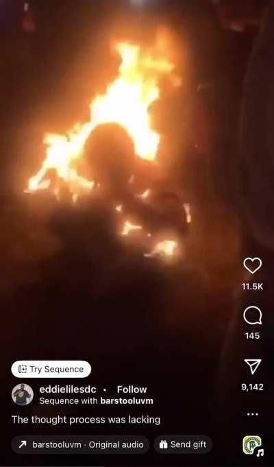 Guy jumps into fire , surprisingly gets set on fire