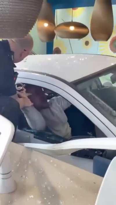 Dude crashes his vehicle into McDonalds while clearly high