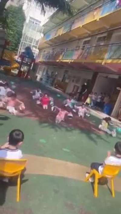 Chinese children learning synchronization and teamwork