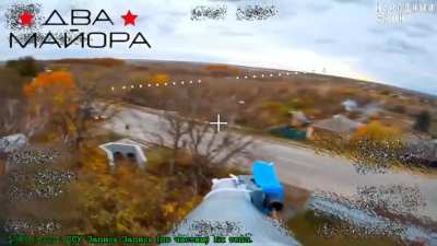 70th Division Fiber-Optics FPV drone operator under automatic rifle fire is still able to position his UAV for a strike on enemy vehicle.