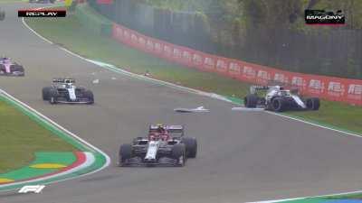 George Russell drives into the barriers during safety car.