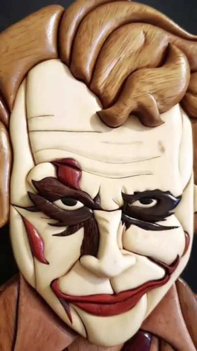 wooden Joker wall piece made from natural tones only