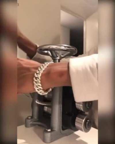 A silver smith doing some manly chains