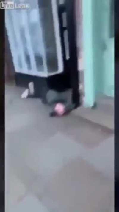 Headbutting the store sign