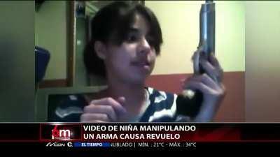 girl shoots gun by accident. the video took place in chile
