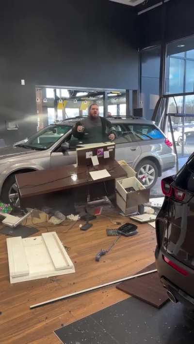 Man crashes into Mazda dealership 