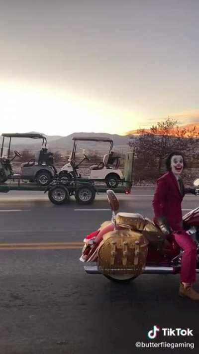This motorcyclist dressed as the Joker