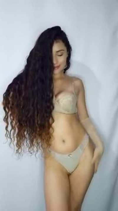 Look me in the eye while you softly move your hands from my thighs to my boobs... and shake them!