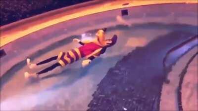 floating goofy in pool listening to hotel in minsk