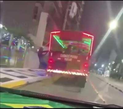 Spiderman Piggy Backing A Bus While Flexing ( & not paying attention )