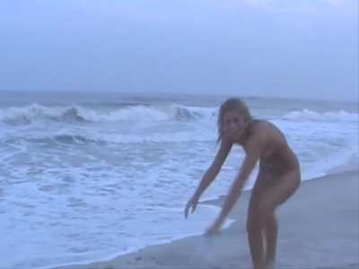 Beach girl strips and flips