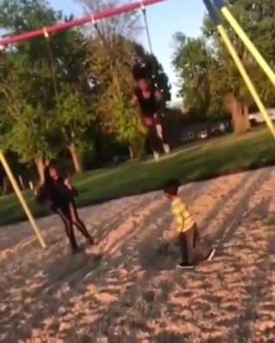 Little idiot narrowly avoids and then walks face first into a swing.