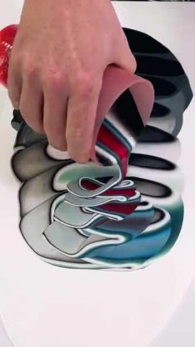 How the paint is being poured