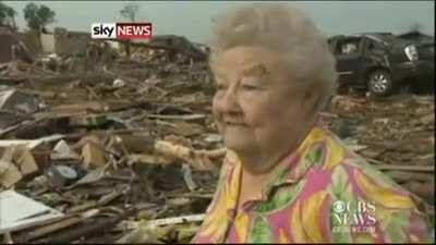 Tornado survivor finds dog buried alive under rubble in the middle of a news interview.