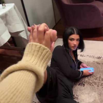 She's used to people playing with her feet