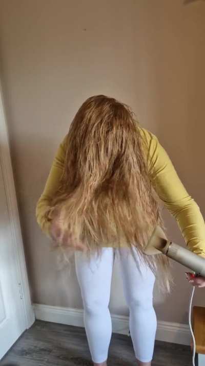 Blow drying my long blonde hair