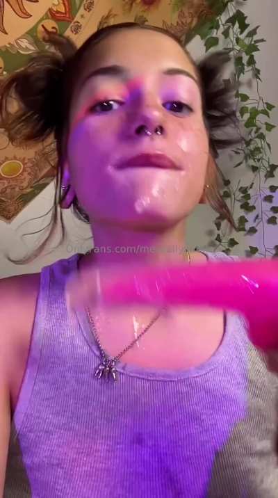 Stuffing her throat with pink dildo