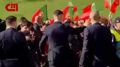 Ronaldo greeting his fans.