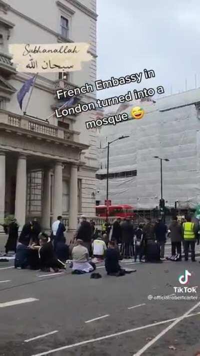 Muslims in the UK pray outside the French Embassy