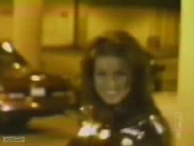 Carmen Electra in a shiny outfit