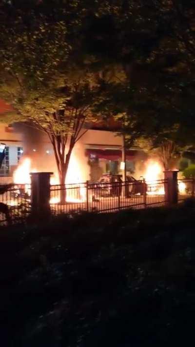 Burning police cars in ATL...National guard in route