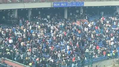 The crowd starts leaving the stadium after Kohli departed!