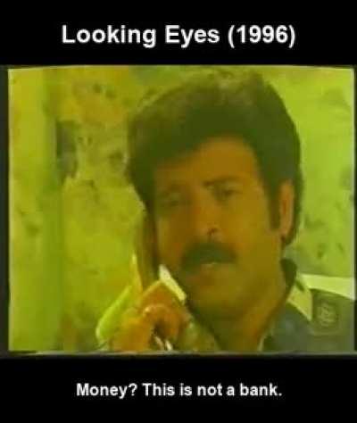 Extortion scene in a Mollywood movie