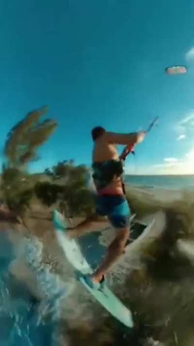 Kitesurfer jumps over an island!