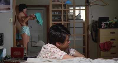 Jun Miho pink curtin (1982) getting dressed