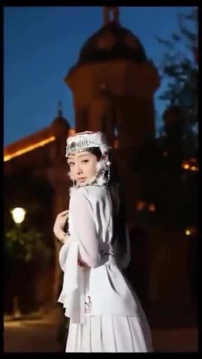 Photographer helping model with her poses