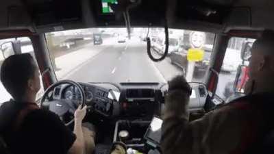 Firefighters rushing to a scene