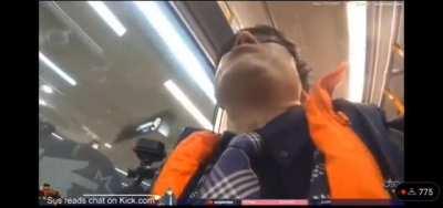 livestreamer in Japan gets called out for playing loud music on the train.