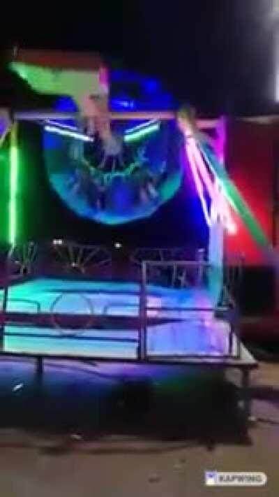 Girl falls from mechanical game