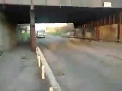 Man films firetruck and train using a Nokia oven