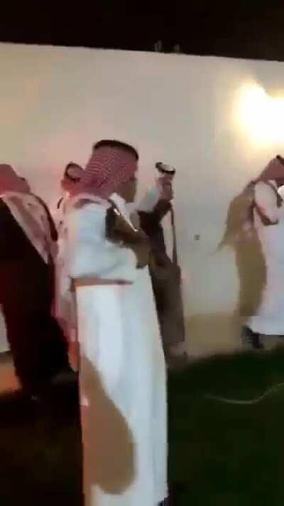 WCGW firing into the sky, at a wedding