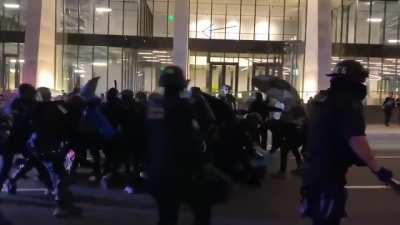Shielded antifa in Portland are quickly taken down by police in downtown tonight.