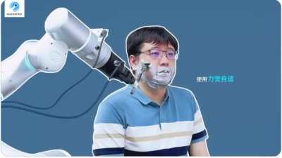 Noematrix co-founder Lu Cewu, being shaved by a robot (Noematrix Secures Alibaba-Led Funding to Accelerate Embodied AI Deployment)